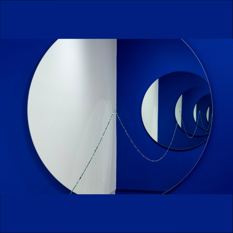 Audie Murray - Blue and white artwork of mirror and beads
