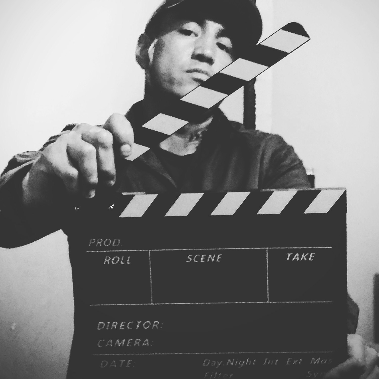 Bee Bird - Man with black and white film clapboard