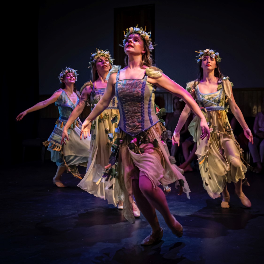 Valentyna Matushenko choreographed Forest Song - Photo of women dressed like mythical fairies mid dance