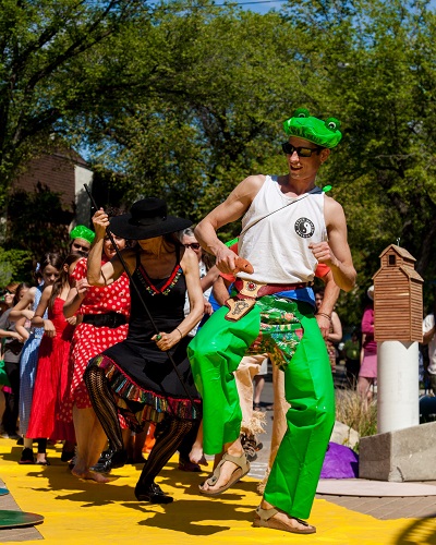 SKArts - New Dance Horizons dancing down the yellow brick/canvas road toward Rapunzel's balcony at the 2015 Cathedral Village Arts Festival.