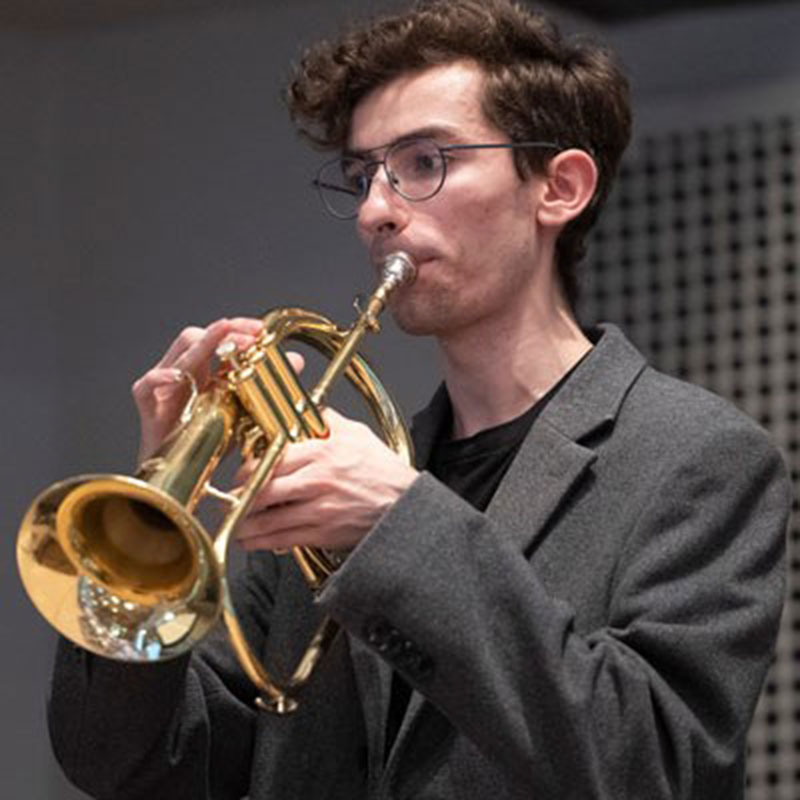 Graeme Dyck - Young man playing a wind instrument